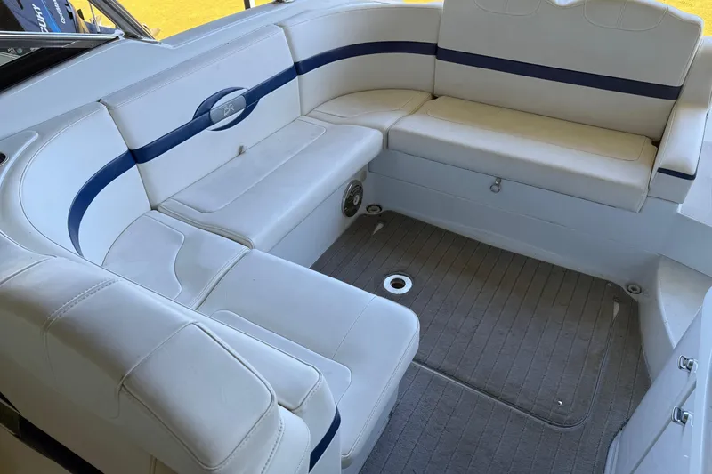 Slide: The Image of 2008 Formula 310 Bowrider interior with white and blue seating. - 12