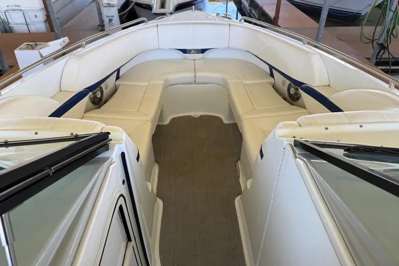 Slide: The Image of 2008 Formula 310 Bowrider interior with white seating and spacious layout. - 5
