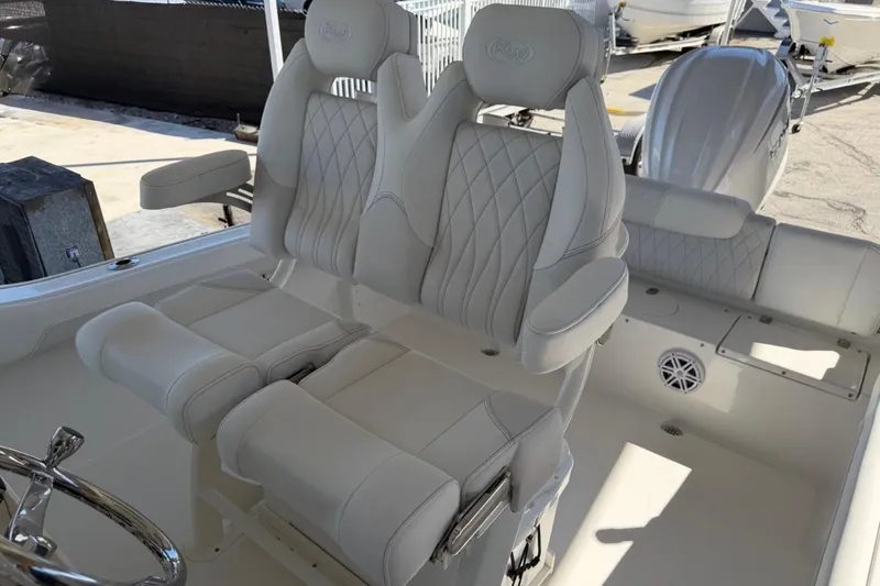 Slide: The Image of Luxurious seating on 2026 Key West 239 FSR boat with elegant white upholstery. - 18