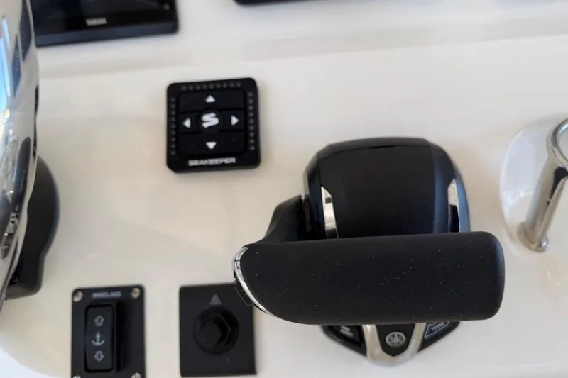 Slide: The Image of Control panel of 2026 Key West 239 FSR boat with throttle and Seakeeper system. - 30