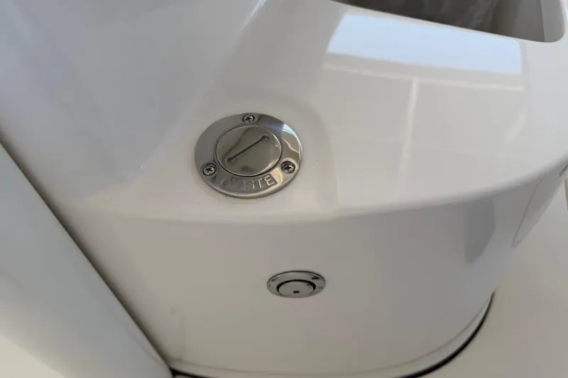 Slide: The Image of Key West 239 FSR 2026 boat waste cap on white surface. - 45