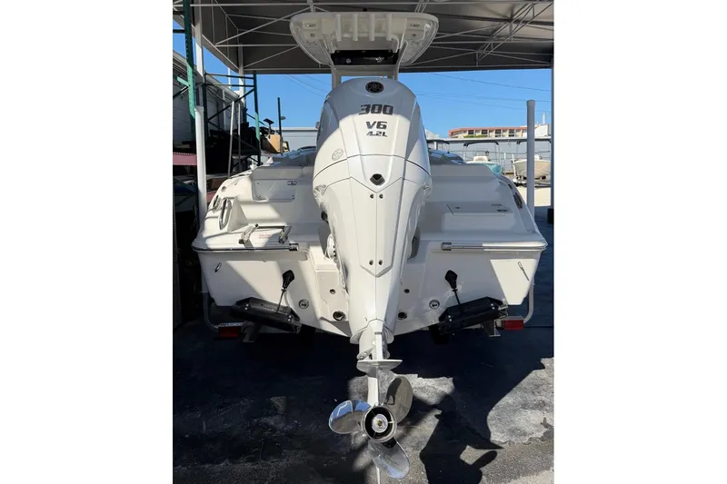 Slide: The Image of 2026 Key West 239 FSR boat with powerful V6 4.2L engine, rear view. - 5