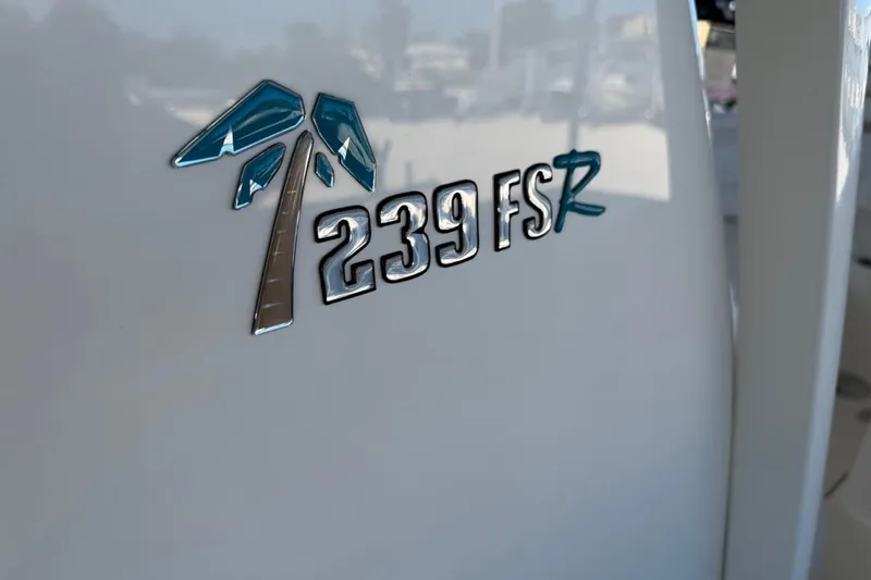 Slide: The Image of Key West 239 FSR 2026 model emblem on boat exterior. - 50