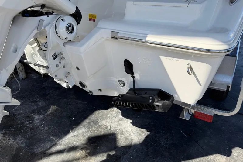 Slide: The Image of Rear view of a 2026 Key West 239 FSR boat on a trailer. - 8