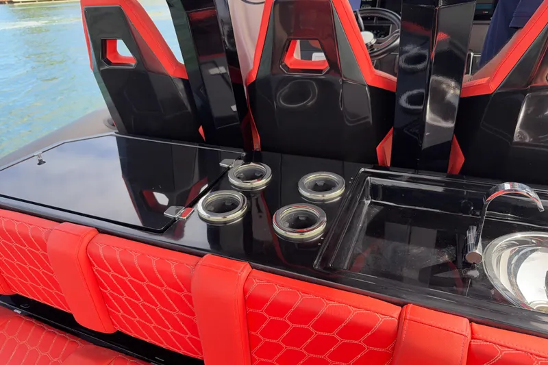 Slide: The Image of Red and black interior of 2023 Skipper-BSK 42NC boat with seating and sink. - 7