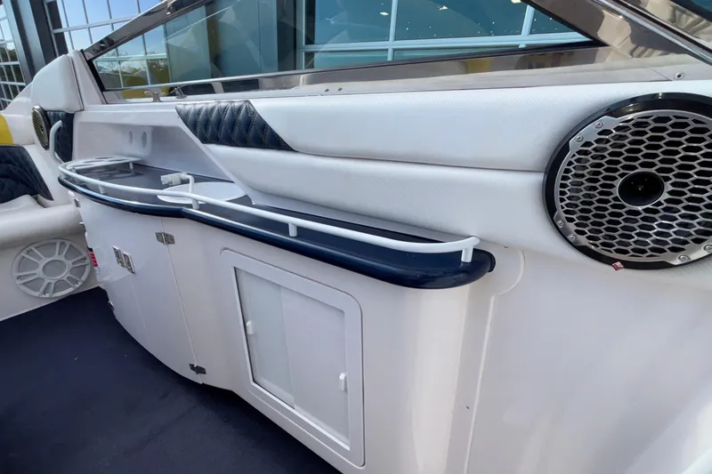 Slide: The Image of 2002 Donzi 45 ZX boat interior with speaker and storage compartments. - 14