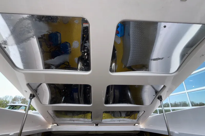 Slide: The Image of Engine compartment of a 2002 Donzi 45 ZX boat with reflective panels. - 25