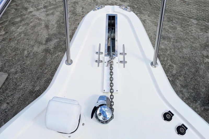 Slide: The Image of Bow of 2002 Stamas 340 Express boat with anchor chain and deck fittings. - 37