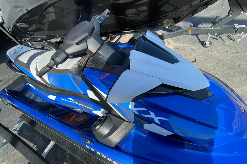 Slide: The Image of 2024 Yamaha WaveRunner VX Cruiser HO in vibrant blue, parked on a trailer. - 3
