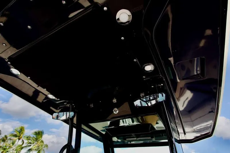 Slide: The Image of Blackfin 302 CC 2023 boat canopy with sleek design and integrated lighting. - 12
