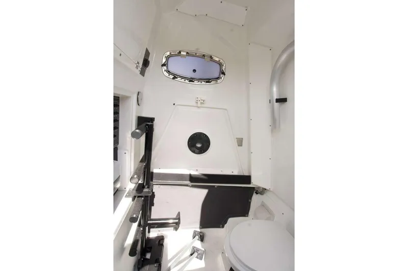 Slide: The Image of Interior of 2023 Blackfin 302 CC boat, featuring a compact, modern design. - 13