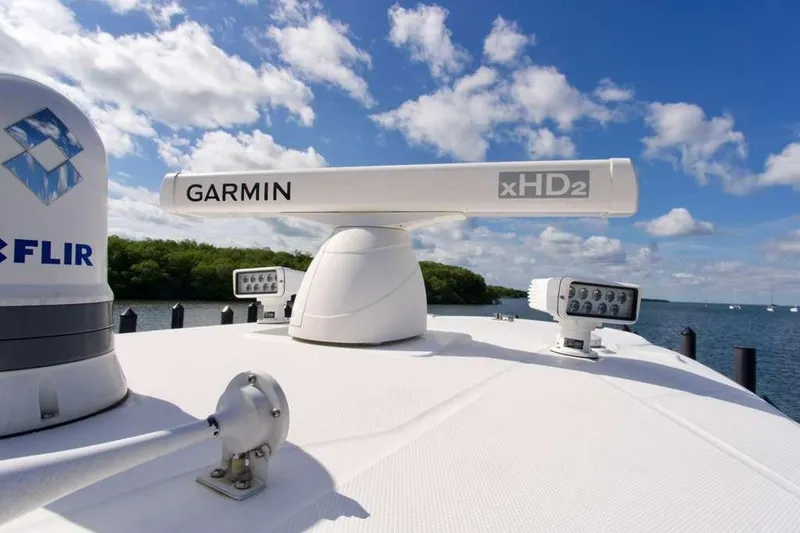 Slide: The Image of 2023 Blackfin 302 CC boat with Garmin xHD2 radar and FLIR system on deck. - 23