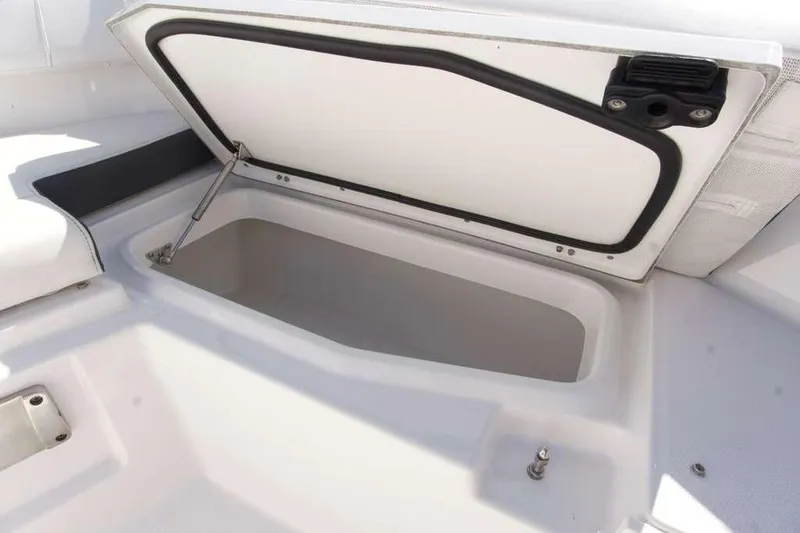 Slide: The Image of Open storage compartment on 2023 Blackfin 302 CC boat. - 31