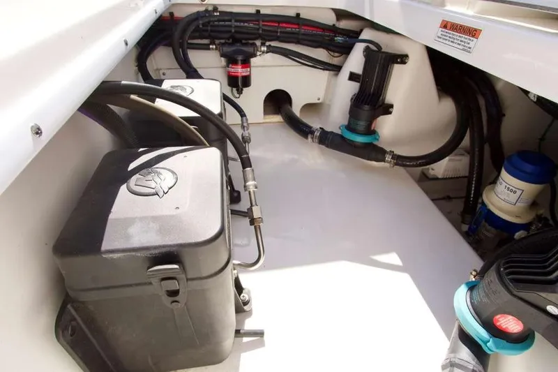 Slide: The Image of 2023 Blackfin 302 CC engine compartment with wiring and components. - 35