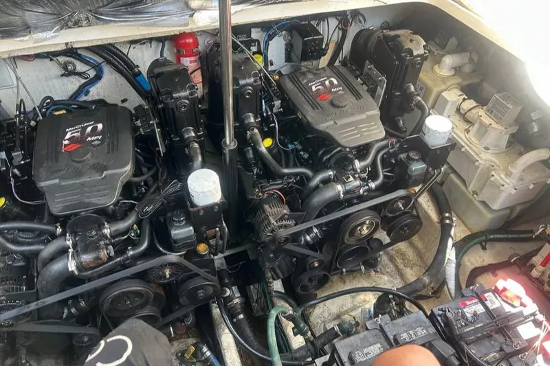 Slide: The Image of Engine compartment of a 2006 Sea Ray 300 Sundancer with dual MerCruiser 5.0 MPI engines. - 20