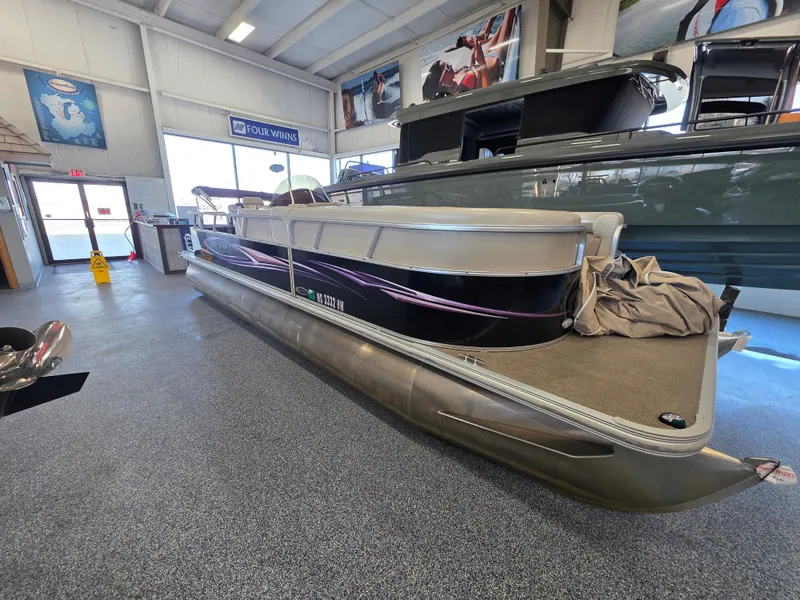 The Image of 2012 Sylvan Mirage 8522 pontoon boat in showroom. - 0