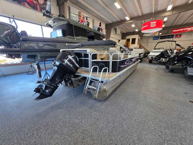 Slide: The Image of Sylvan Mirage 8522 pontoon boat in showroom, year 2012. - 1