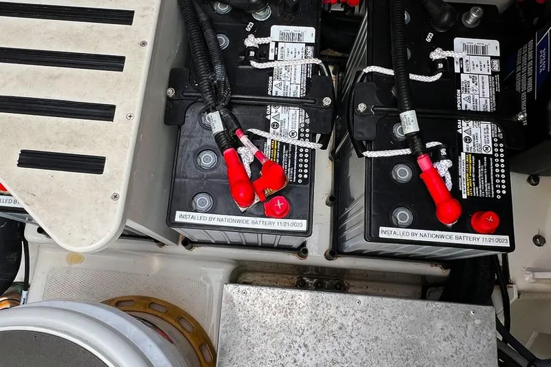 Slide: The Image of Batteries installed on a 2018 Boston Whaler 420 Outrage boat, labeled by Nationwide Battery. - 19