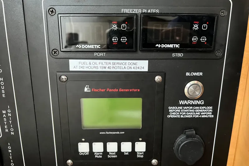 Slide: The Image of Control panel of a 2018 Boston Whaler 420 Outrage with Fischer Panda Generators. - 21