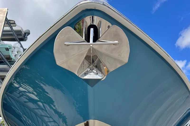 Slide: The Image of 2018 Boston Whaler 420 Outrage boat bow with anchor against blue sky. - 29