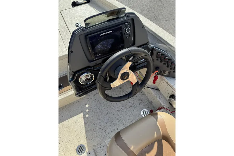 Slide: The Image of Steering console of 2019 Xpress X17 Pro boat with navigation system. - 5