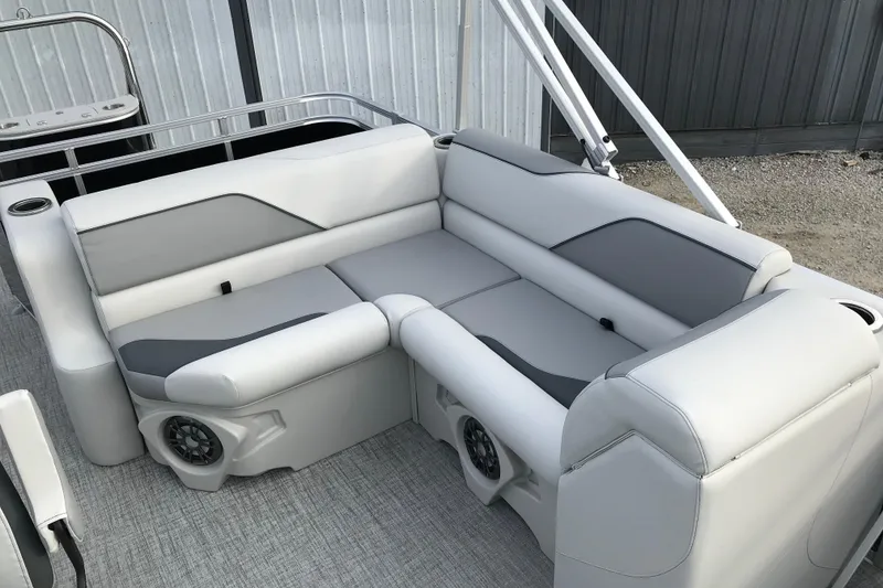 Slide: The Image of 2026 Avalon Venture Cruise Rear Bench with gray and white upholstery on a boat deck. - 11