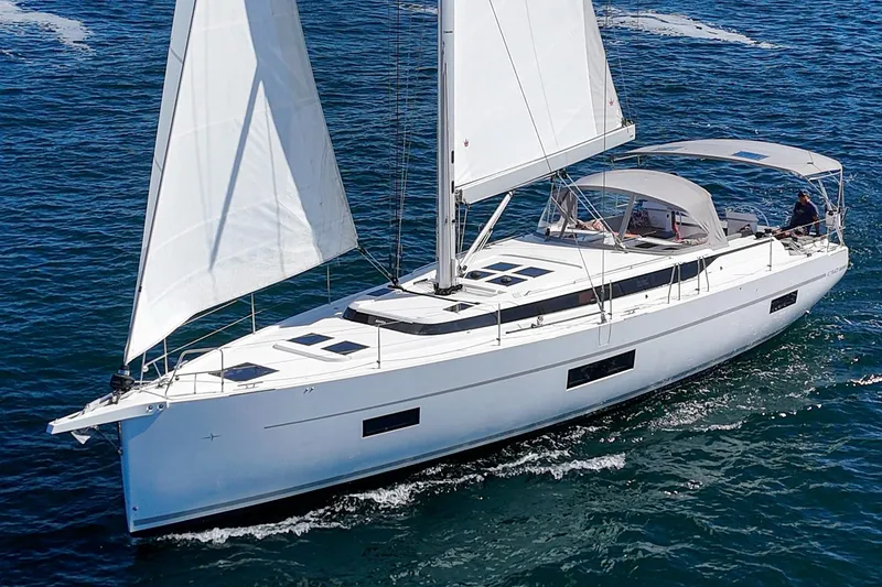The Image of 2023 Bavaria C50 sailing yacht cruising on open water. - 0