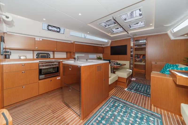 Slide: The Image of Luxurious interior of 2023 Bavaria C50 yacht with modern kitchen and seating area. - 31