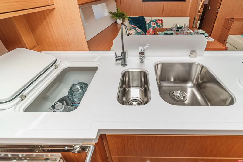 Slide: The Image of Modern kitchen area in 2023 Bavaria C50 yacht with dual sinks and storage. - 37