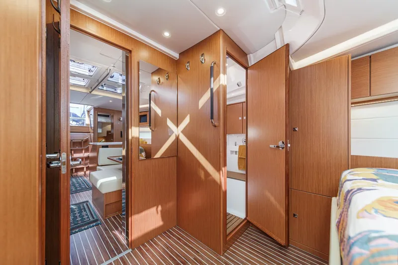 Slide: The Image of Luxurious interior of 2023 Bavaria C50 yacht with wood finish and modern design. - 54