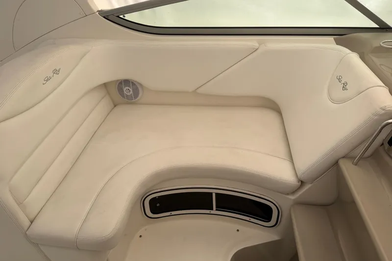 Slide: The Image of Luxurious seating area on a 2007 Sea Ray Sundancer 280 boat, featuring cream upholstery. - 9