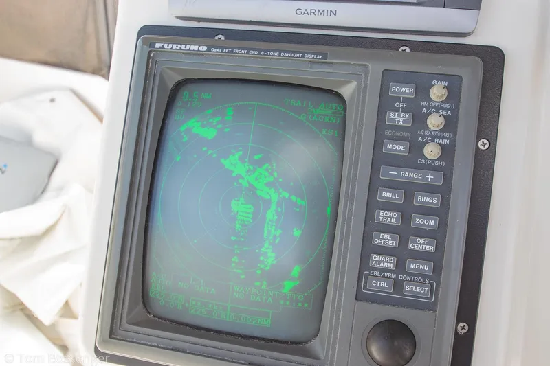 Slide: The Image of Radar display on 1996 Silverton 372 Motor Yacht, showing navigation data. - 41