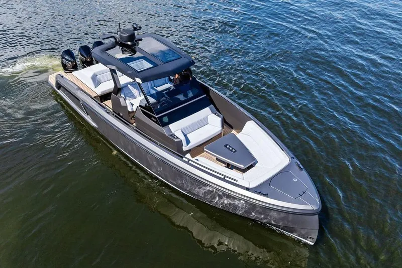 Slide: The Image of 2024 Vanquish Yachts 40 cruising on open water, showcasing sleek design and luxury features. - 14