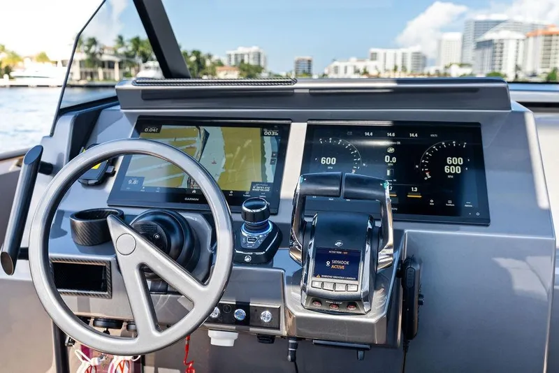 Slide: The Image of Cockpit of 2024 Vanquish Yachts 40 with modern navigation and control systems. - 15
