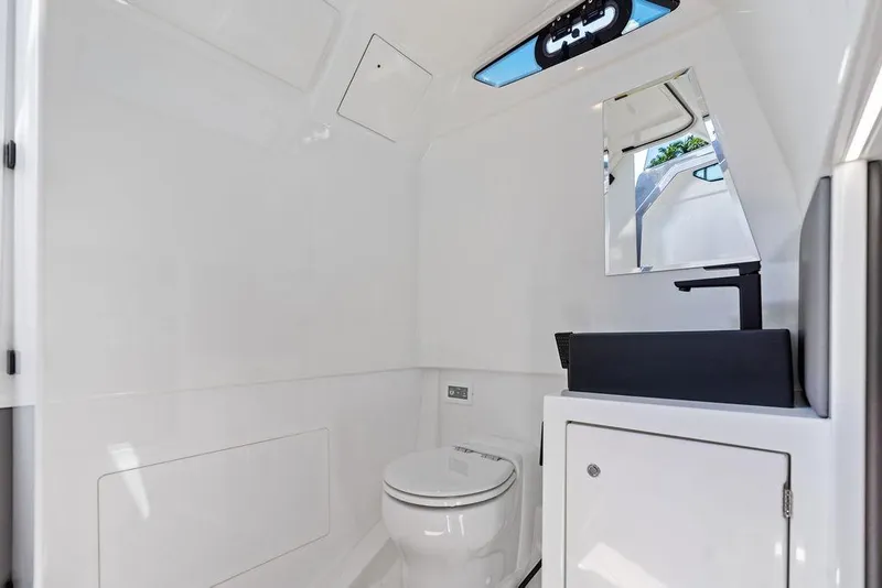 Slide: The Image of Luxurious bathroom interior of 2024 Vanquish Yachts 40, featuring modern fixtures and sleek design. - 39
