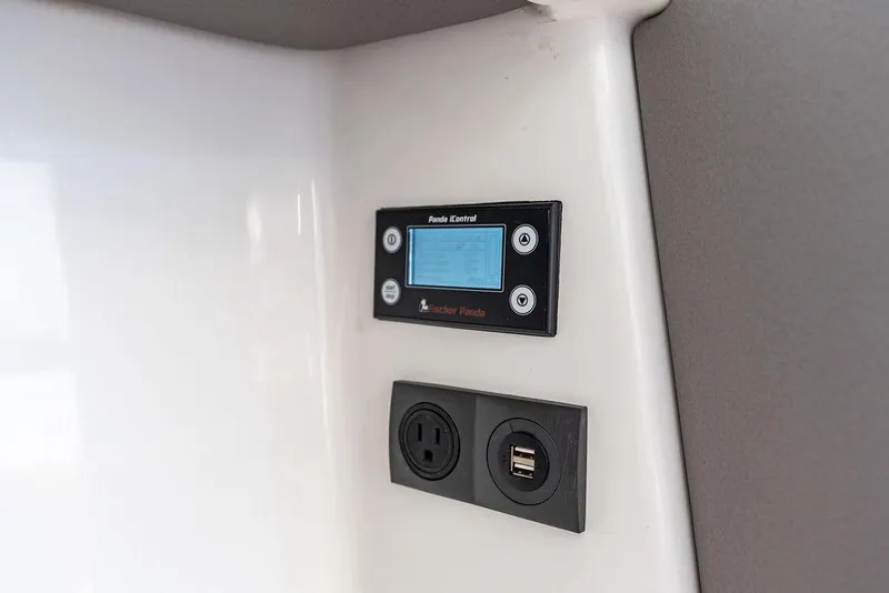 Slide: The Image of Control panel and outlets on 2024 Vanquish Yachts 40 interior. - 42