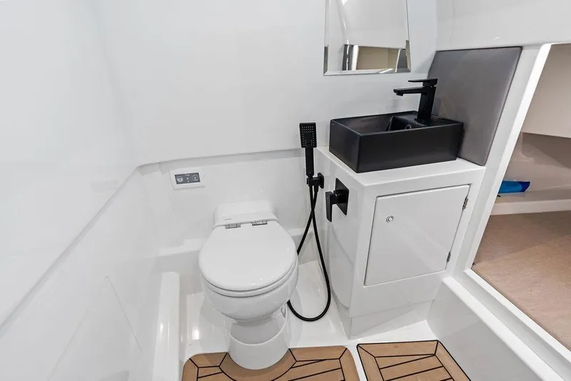 Slide: The Image of Modern bathroom in 2024 Vanquish Yachts 40, featuring sleek fixtures and compact design. - 44