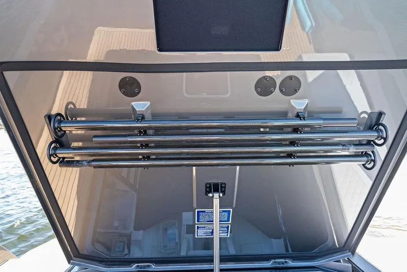 Slide: The Image of 2024 Vanquish Yachts 40, sleek carbon fiber detailing, open hatch view. - 49