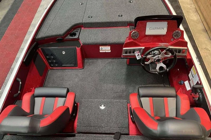 Slide: The Image of Interior of 2026 Nitro Z18 Pro boat with Garmin dashboard and red-black seating. - 4