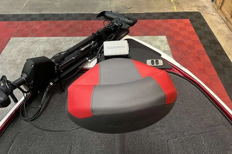 Slide: The Image of Red and gray seat on a 2026 Nitro Z18 Pro boat with Garmin equipment. - 7