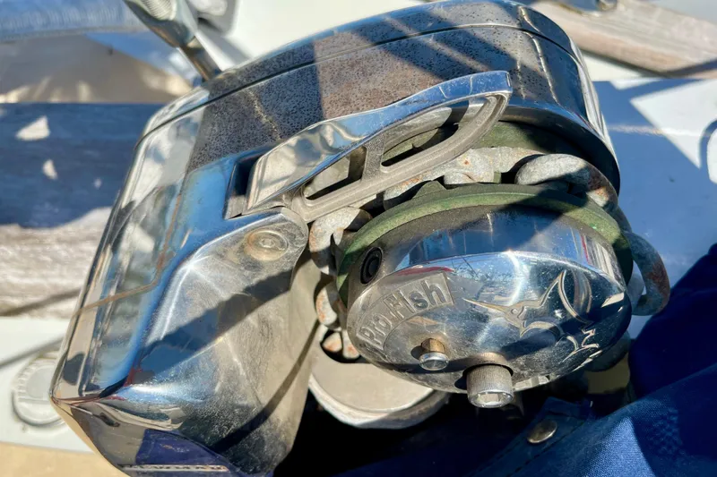 Slide: The Image of Vintage 1978 Downeast 38 boat winch with polished metal finish. - 12