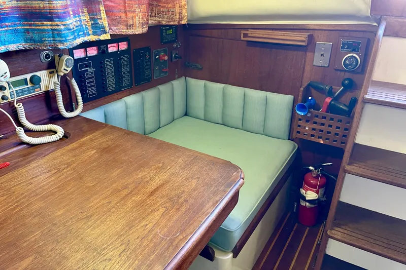 Slide: The Image of 1978 Downeast 38 yacht interior with navigation equipment and seating area. - 26
