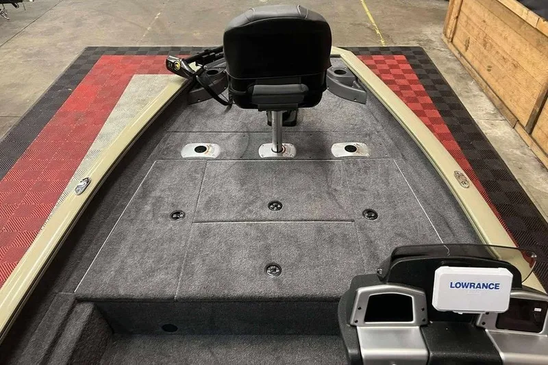 Slide: The Image of 2026 Tracker Pro Team 175 boat interior with Lowrance system and seating. - 7