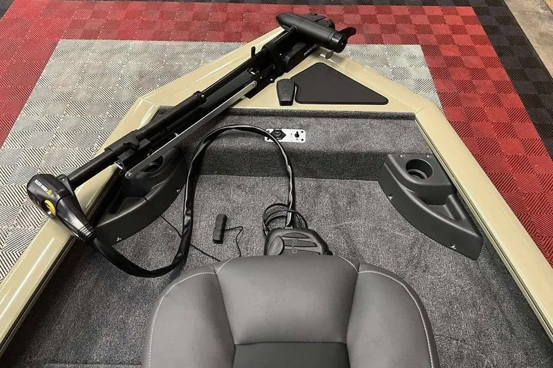 Slide: The Image of 2026 Tracker Pro Team 175 boat interior with trolling motor and seating. - 8