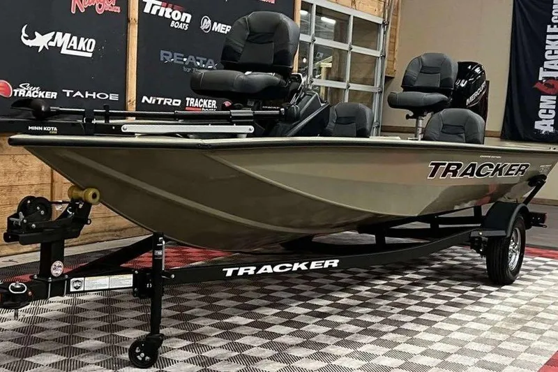 Slide: The Image of 2026 Tracker Pro Team 175 fishing boat on display in showroom. - 9