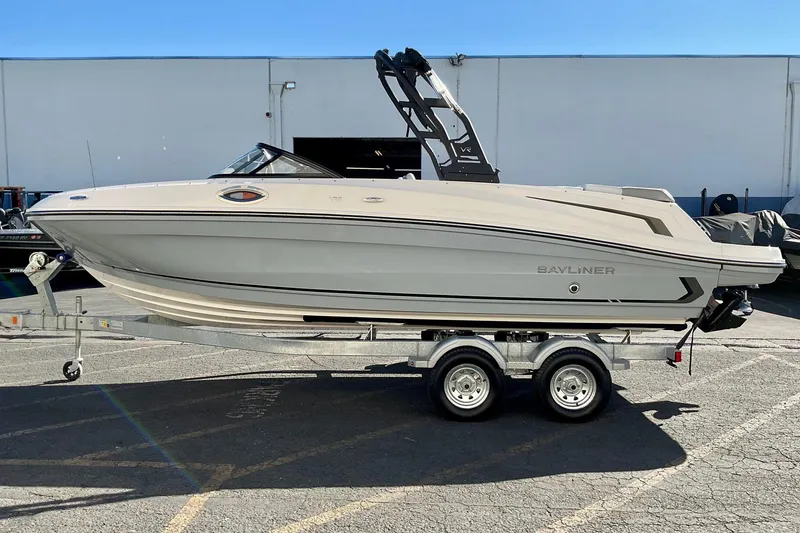 The Image of 2026 Bayliner VR6 Bowrider I/O on trailer, parked outdoors. - 0