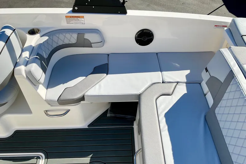Slide: The Image of 2026 Bayliner VR6 Bowrider I/O interior seating with modern upholstery and sleek design. - 20