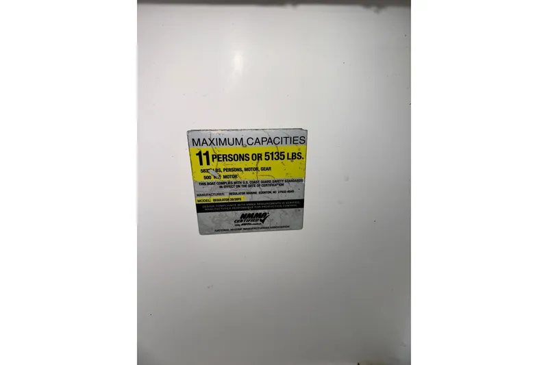 Slide: The Image of Capacity label on 2005 Regulator 26 Center Console: 11 persons or 5135 lbs. - 15