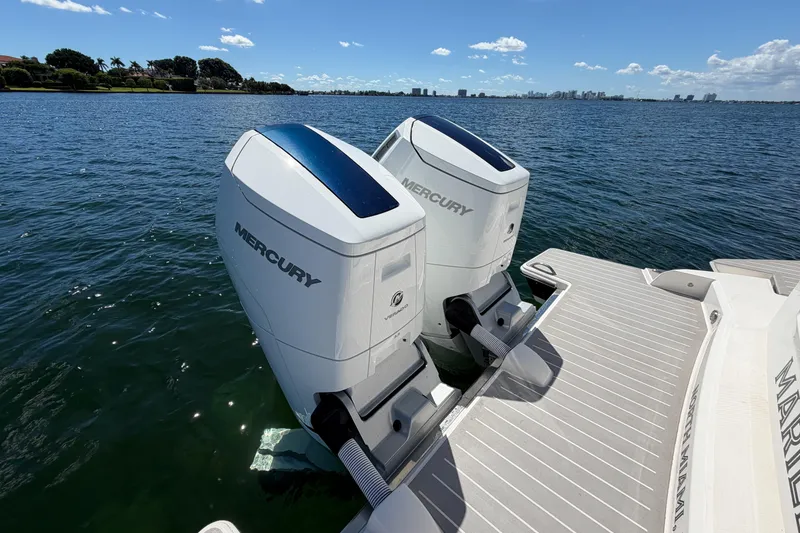 Slide: The Image of 2024 Tiara Yachts 43 LS with dual Mercury outboard engines on a sunny day. - 16