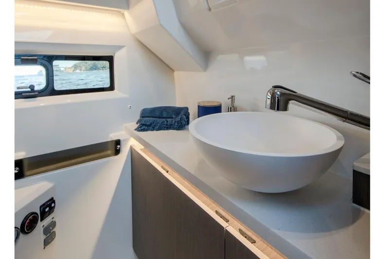 Slide: The Image of Modern bathroom interior of 2026 Jeanneau NC 895 Series 2 boat, featuring sleek design elements. - 20